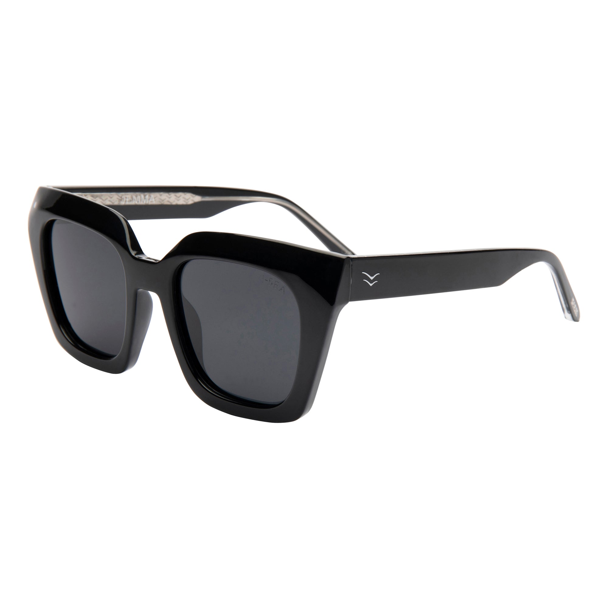 Black sunglasses with gold logo on a white background.
INK / SMOKE POLARIZED LENS