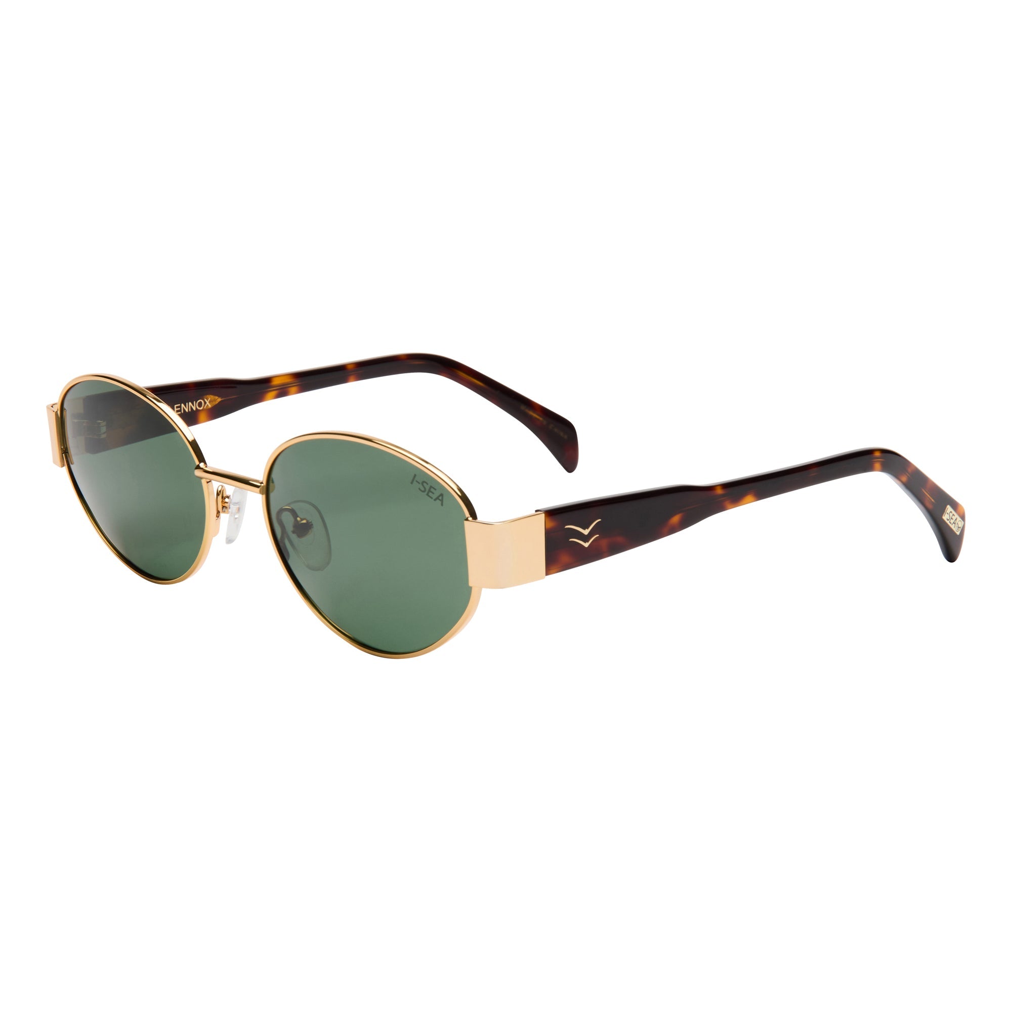 Sunglasses with tortoiseshell frame and green lenses on a white background.
GOLD / GREEN POLARIZED LENS