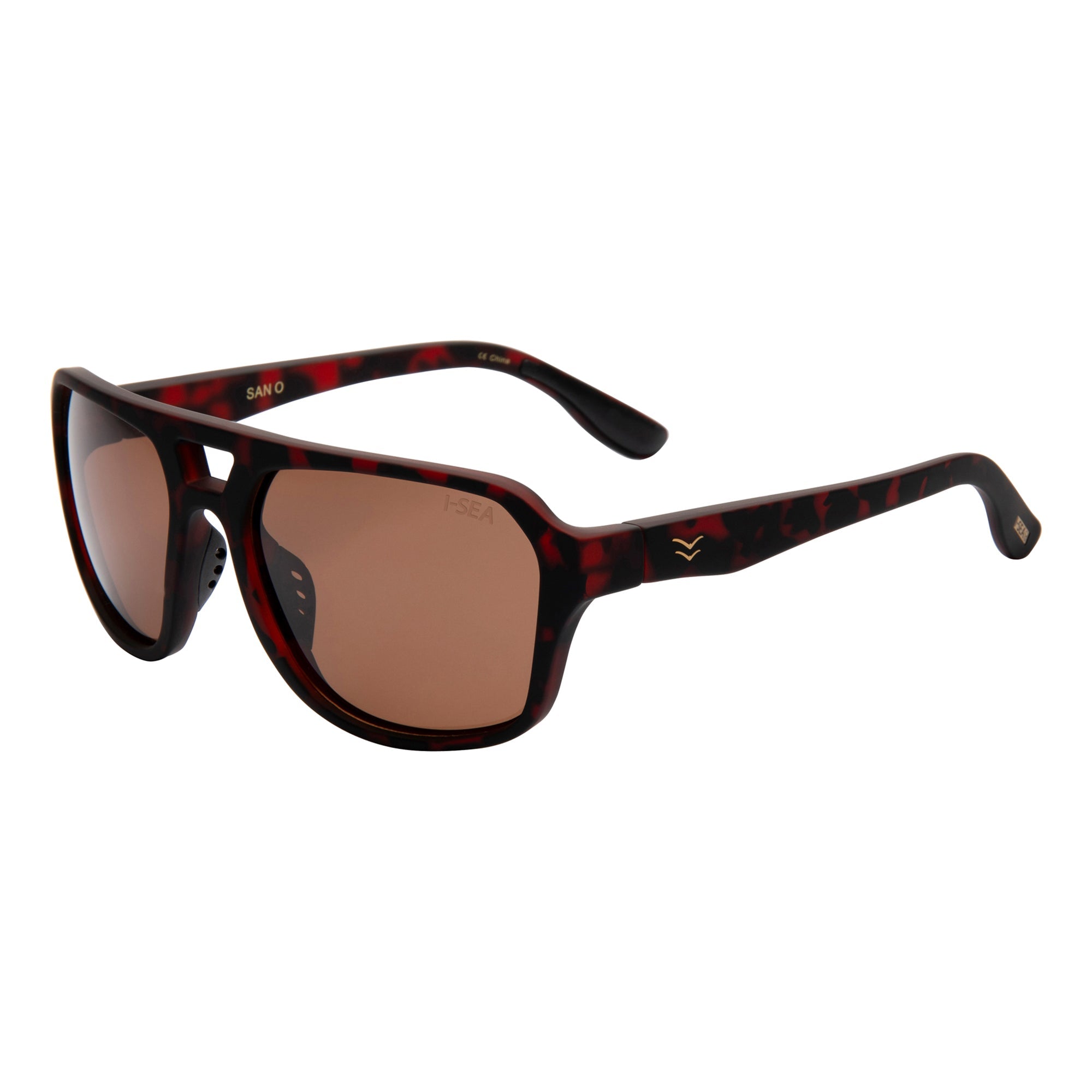 Sunglasses with brown lenses and red and black frame on a white background.
TORT / BROWN POLARIZED LENS
