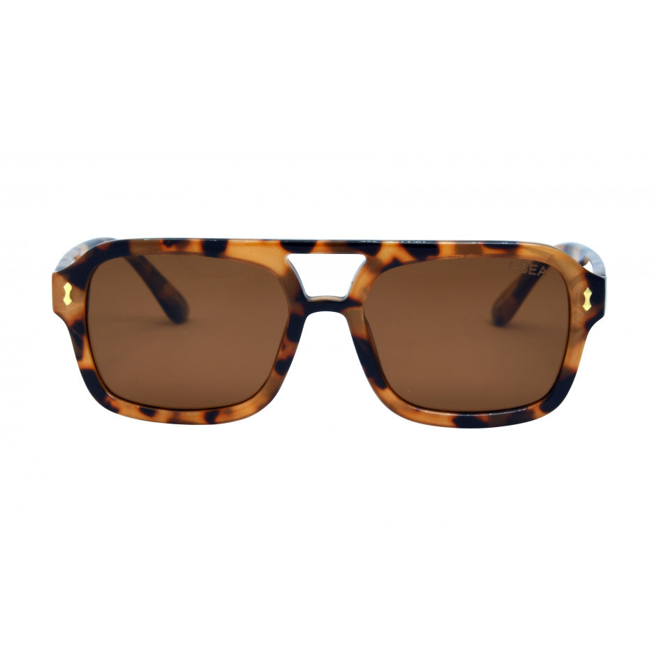 Sunglasses with tortoiseshell frame and brown lenses on a white background.
YELLOW TORT / BROWN POLARIZED LENS
