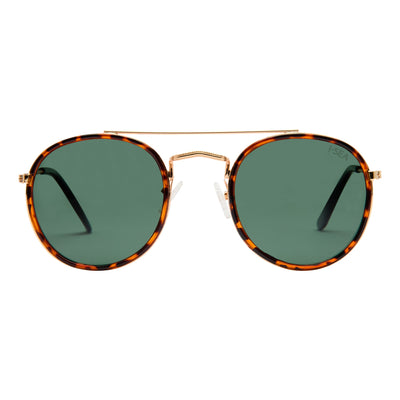 Sunglasses with tortoiseshell frame and green lenses on a white background.
MATTE TORT / GREEN POLARIZED LENS