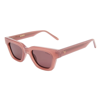 Pink sunglasses with a subtle brand logo on a white background.
DUSTY ROSE / PLUM POLARIZED LENS