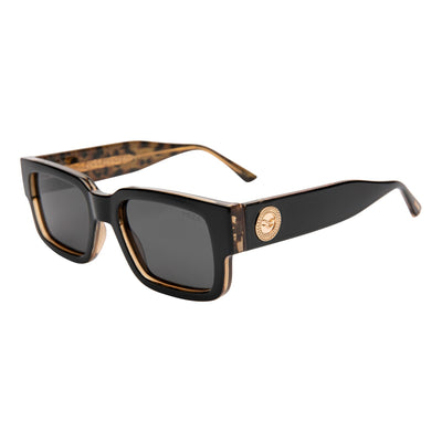Sunglasses with a gold and black frame on a white background.
BLACK LEOPARD / SMOKE POLARIZED LENS