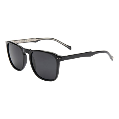 Black sunglasses with red accents on a white background.
INK / SMOKE POLARIZED LENS