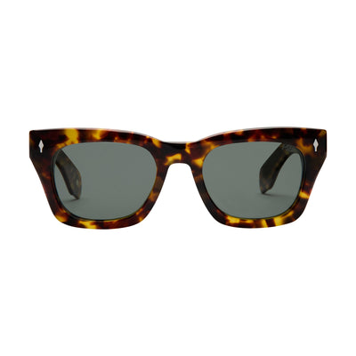 Sunglasses with tortoiseshell frame and dark lenses on a white background.
TORT / GREEN POLARIZED LENS