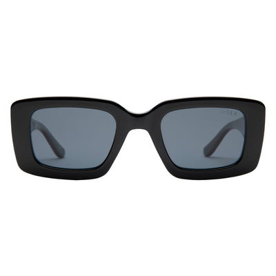 Black sunglasses with dark lenses on a white background.
BLACK / SMOKE POLARIZED LENS
