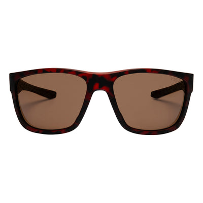Sunglasses with a tortoiseshell frame and brown lenses on a white background.
TORT RUBBER / BROWN POLARIZED LENS