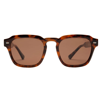 Sunglasses with tortoiseshell frame and brown lenses on a white background.
TORT / BROWN POLARIZED LENS