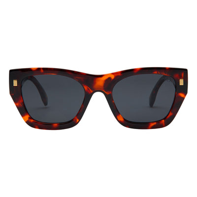 Sunglasses with tortoiseshell frame and dark lenses on a white background.
TORT / SMOKE POLARIZED LENS