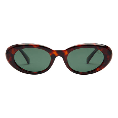 Sunglasses with tortoiseshell frame and green lenses on a white background.
TORT / GREEN POLARIZED LENS