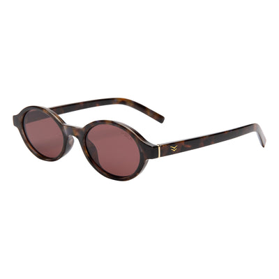 Sunglasses with tortoiseshell frame and red lenses on a white background.
TORT / PLUM POLARIZED LENS