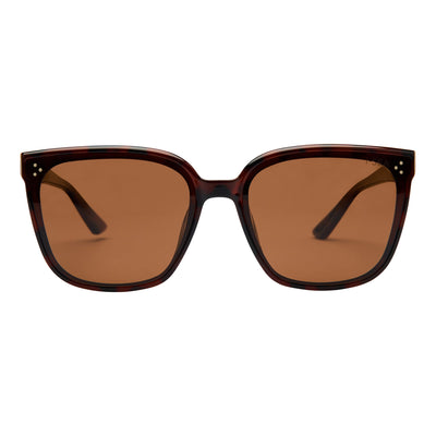 Sunglasses with brown lenses and tortoiseshell frame on a white background.
TORT / BROWN POLARIZED LENS