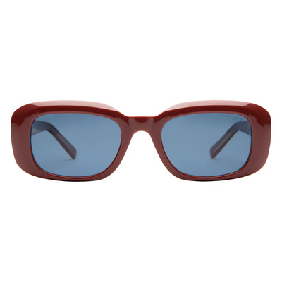 Sunglasses with red frame and blue lenses on a white background.
TERRACOTTA / NAVY POLARIZED LENS