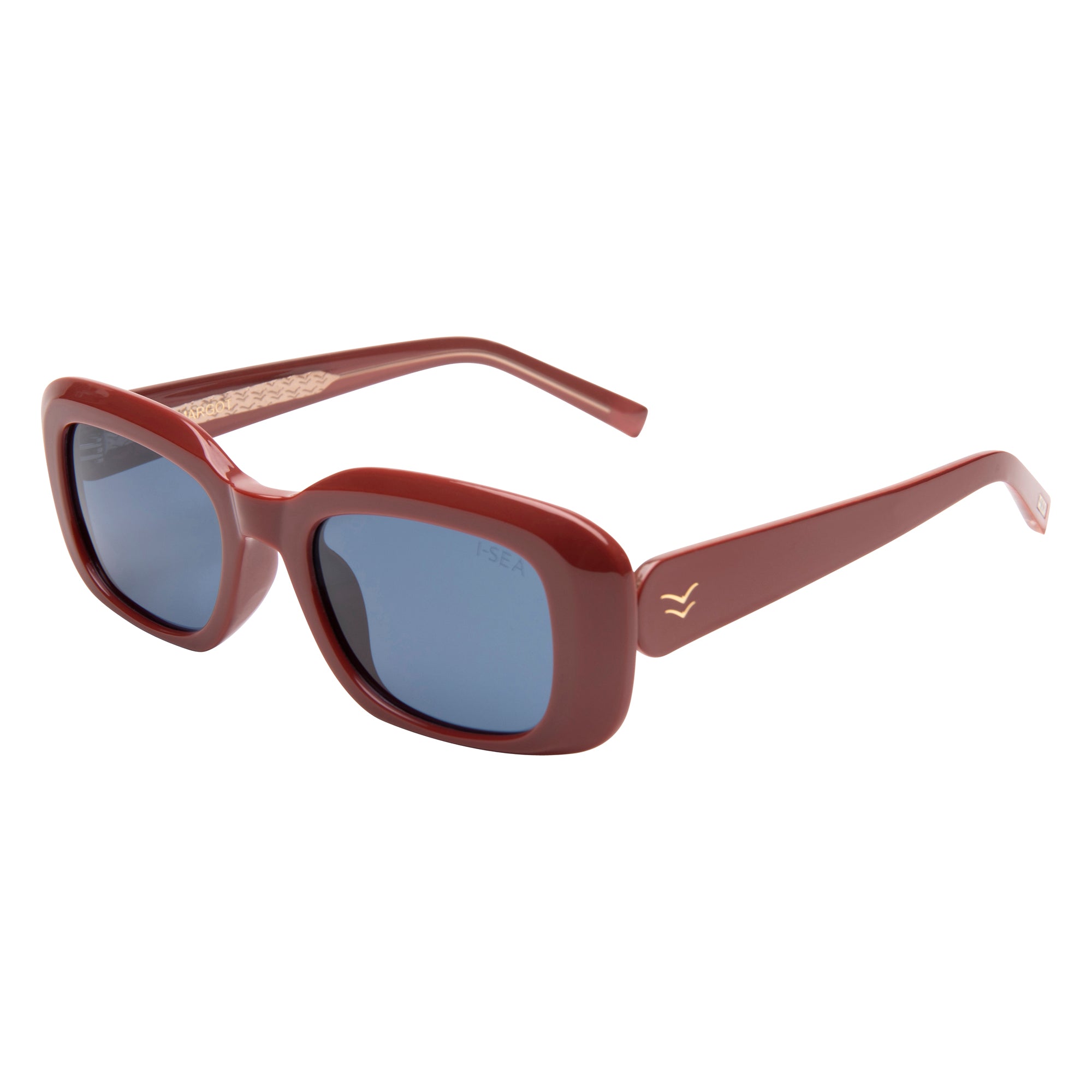 Red sunglasses with blue lenses on a white background.
TERRACOTTA / NAVY POLARIZED LENS