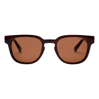 Brown sunglasses with a white background.
TORT / BROWN POLARIZED LENS