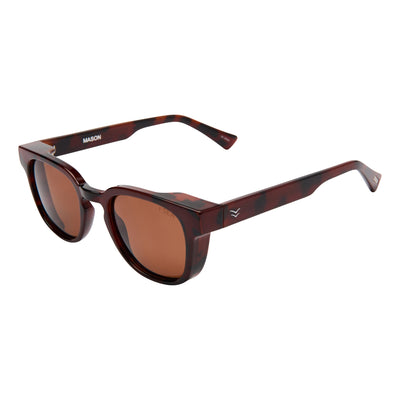 Brown sunglasses with a brand name on a white background.
TORT / BROWN POLARIZED LENS