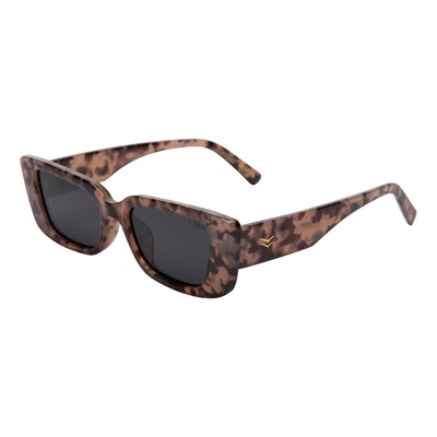 Sunglasses with leopard print frame and dark lenses on a white background.
BLONDE TORT / SMOKE POLARIZED LENS