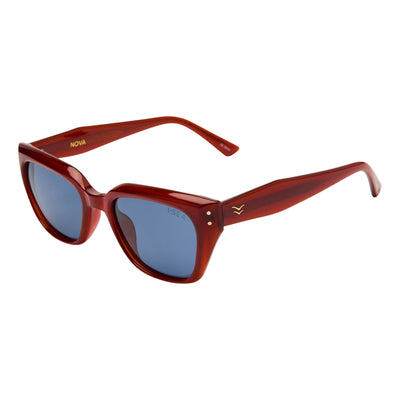 Red sunglasses with blue lenses on a white background.
GINGER / SKY POLARIZED LENS