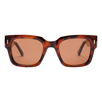 Sunglasses with tortoiseshell frame and brown lenses on a white background.
TORT / BROWN POLARIZED LENS