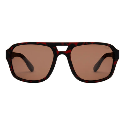 Sunglasses with brown lenses and black frame on a white background.
TORT / BROWN POLARIZED LENS