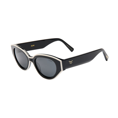 Black and gold sunglasses with a visible brand logo on a white background.
BLACK / SMOKE POLARIZED LENS