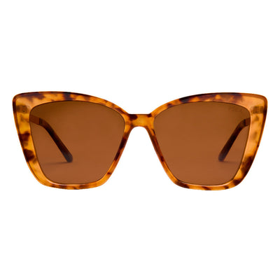 Tortoiseshell cat-eye sunglasses with brown lenses on a white background.
TORT / BROWN POLARIZED LENS