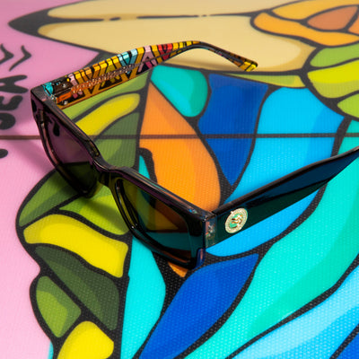 Sunglasses with colorful design on a vibrant background.
TAHITI PRO / SMOKE POLARIZED LENS