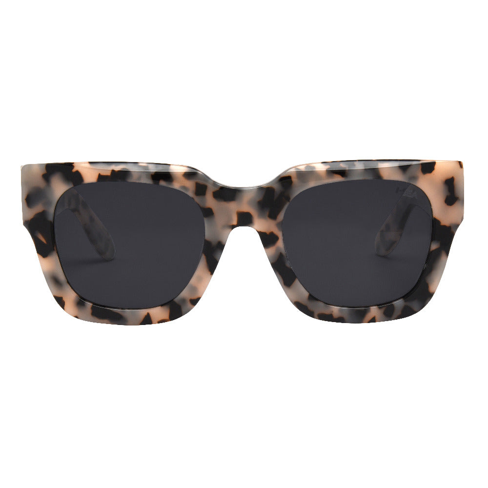 Sunglasses with tortoiseshell frame and dark lenses on a white background.
SNOW TORT / SMOKE POLARIZED LENS