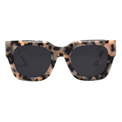 Sunglasses with tortoiseshell frame and dark lenses on a white background.
SNOW TORT / SMOKE POLARIZED LENS