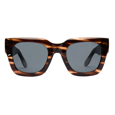 Sunglasses with tortoiseshell frame and dark lenses on a white background.
TIGER STRIPE / SMOKE POLARIZED LENS