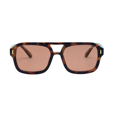 Sunglasses with tortoiseshell frame and brown lenses on a white background.
TORT / PEACH LENS