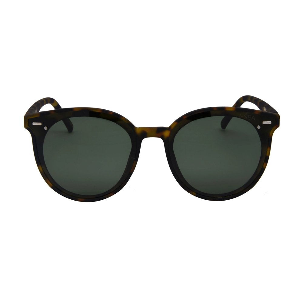 Sunglasses with tortoiseshell frame and dark lenses on a white background.
TORT / G15 POLARIZED LENS