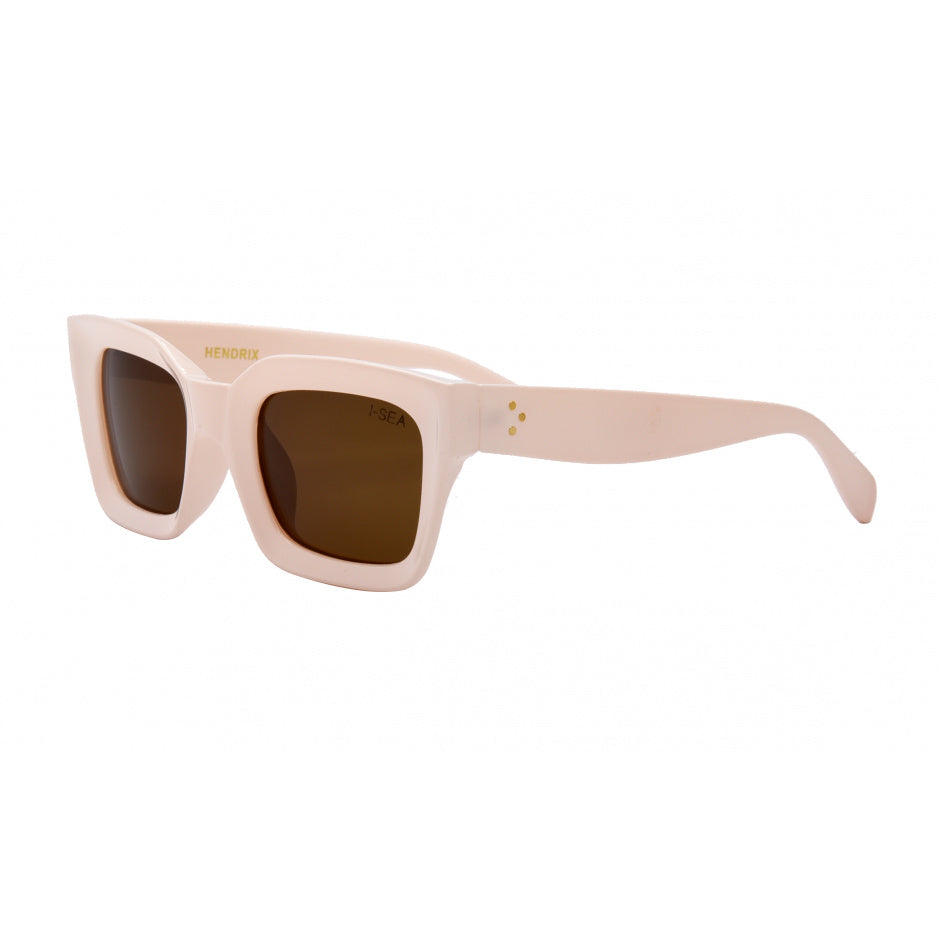 Gold-framed sunglasses with brown lenses on a white background.
Creme / Brown Polarized Lens