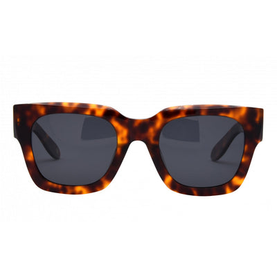 Sunglasses with tortoiseshell frame and dark lenses on a white background.
TORT / SMOKE POLARIZED LENS