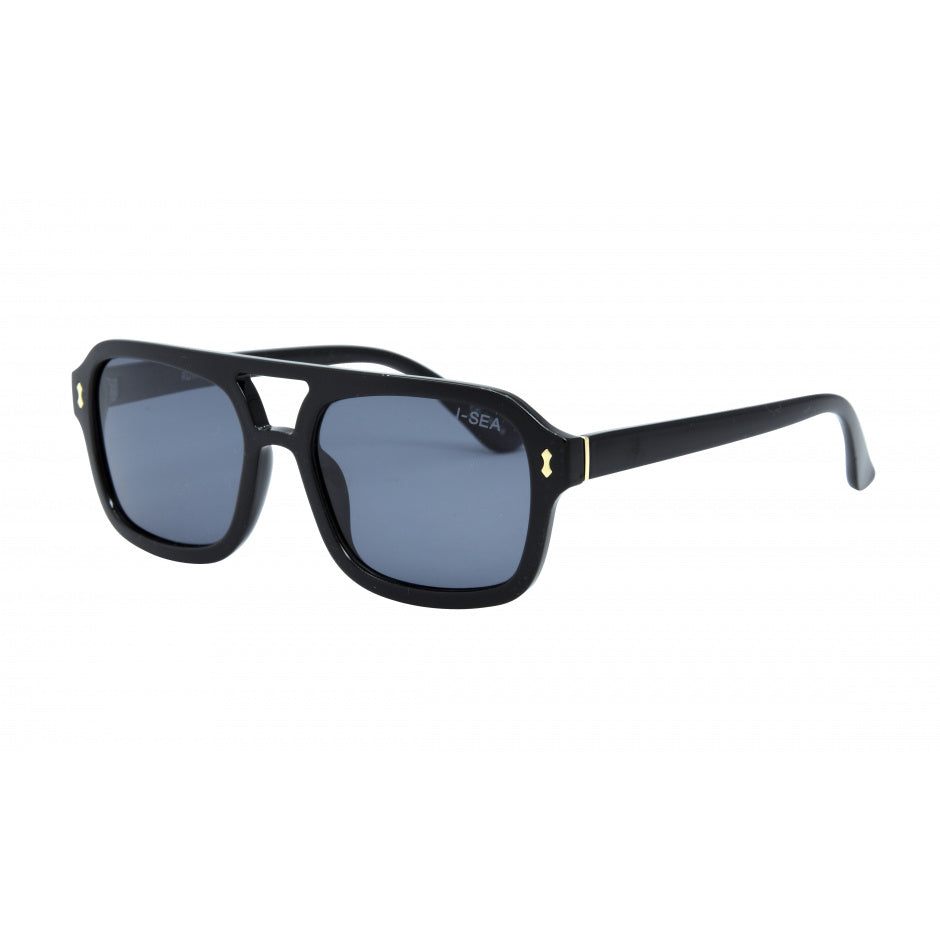 Black sunglasses with a gold logo on a white background.
BLACK / SMOKE POLARIZED LENS