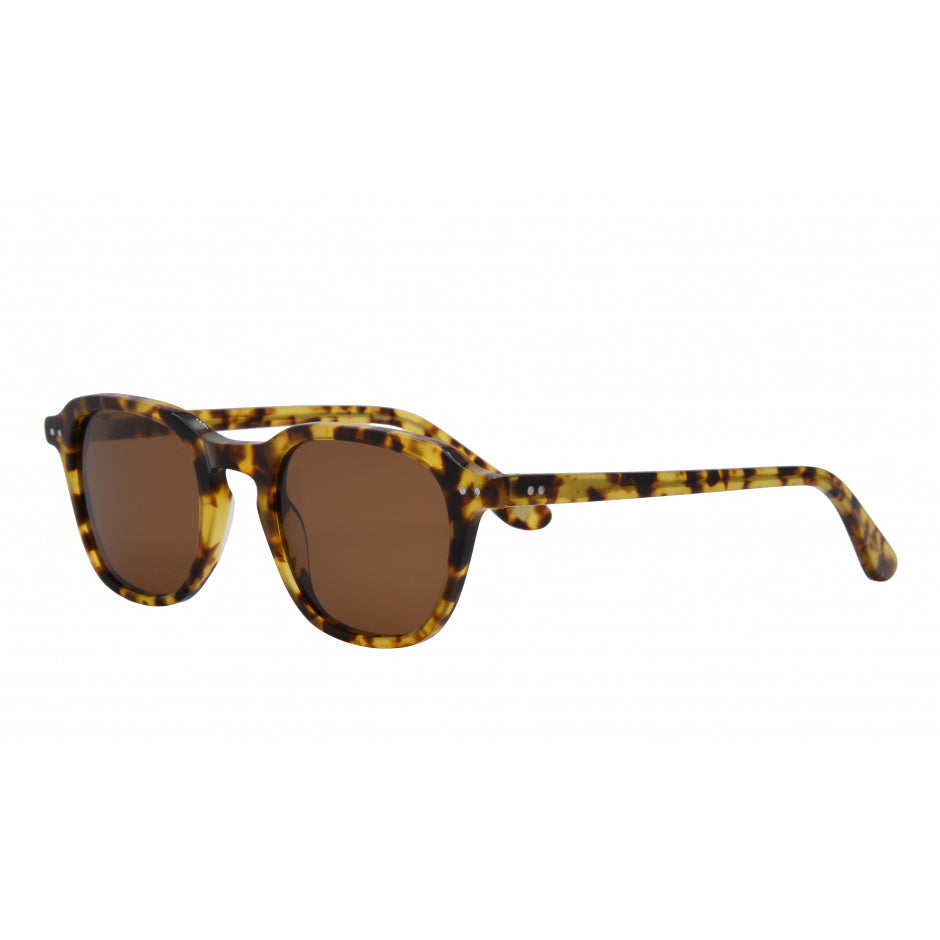 Sunglasses with tortoiseshell frame and brown lenses on a white background.
TORT / BROWN POLARIZED LENS