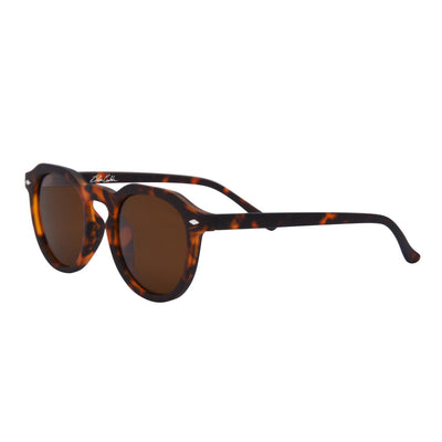 Sunglasses with tortoiseshell frame and brown lenses on a white background.
TORT / BROWN POLARIZED LENS