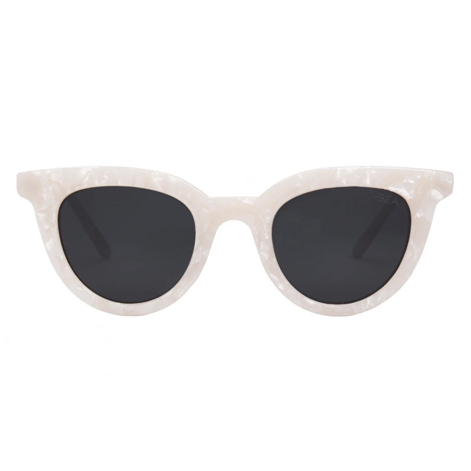 Cat-eye sunglasses with white frame and dark lenses on a white background.
Pearl / Smoke Polarized Lens