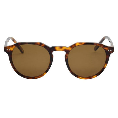 Sunglasses with tortoiseshell frame and brown lenses on a white background.
TORT ACETATE / BROWN POLARIZED LENS